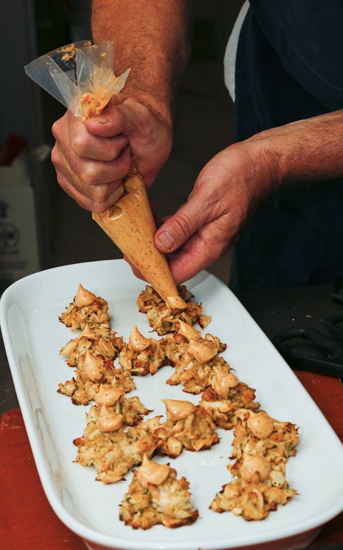 Crab cakes topped with remoulade